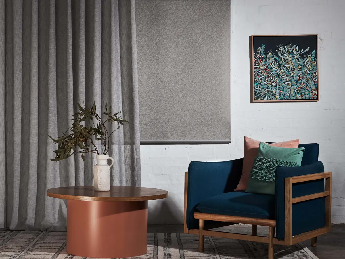 Maurice Kain Odin textured curtains beside an armchair
