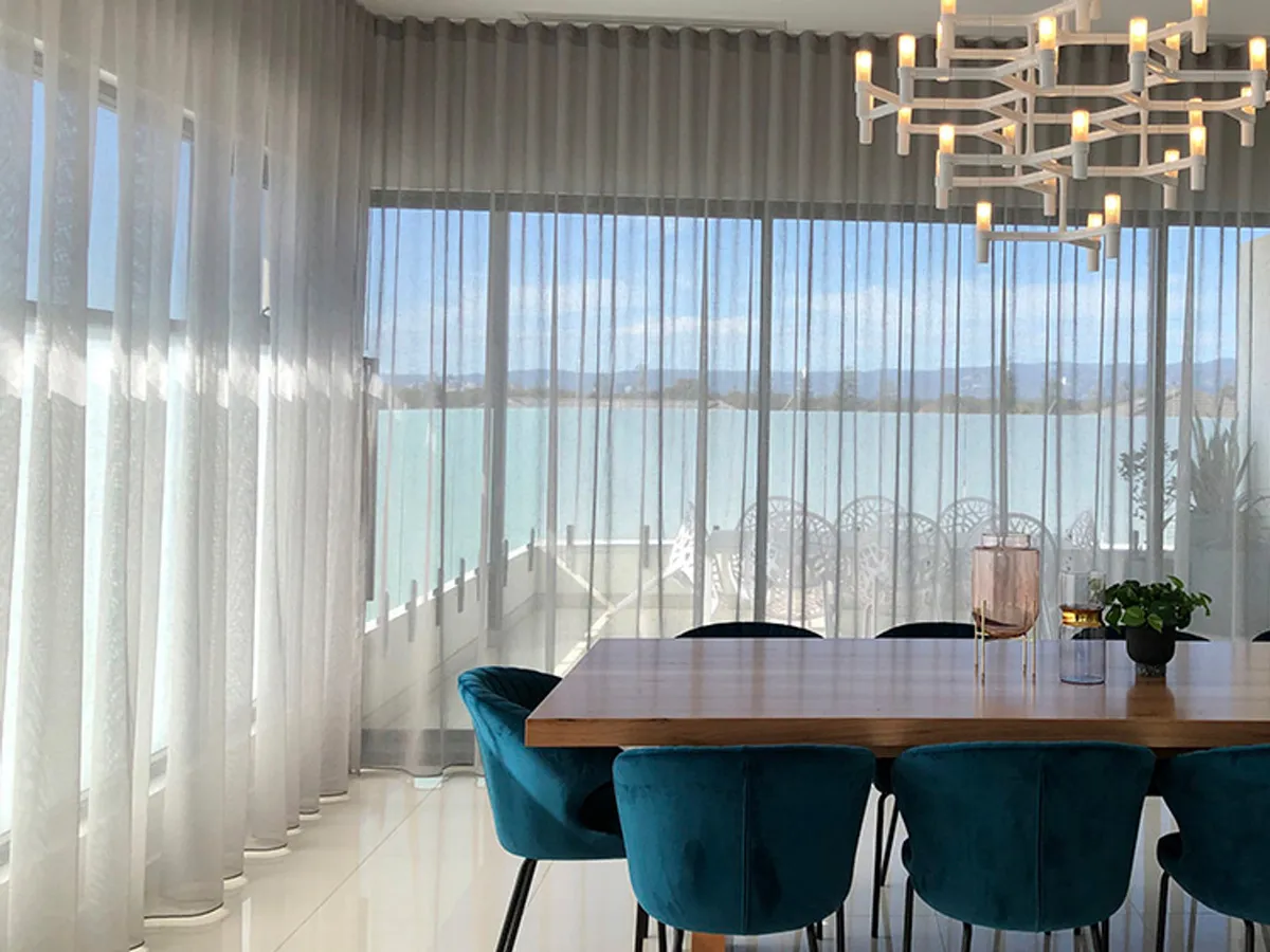 Nettex Bali sheer curtains softening a dining room