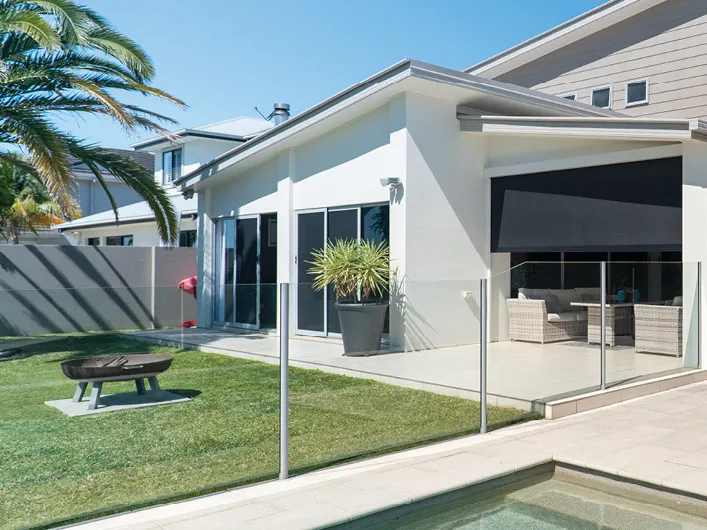 Shaw outdoor blinds shading a Queensland home and pool area